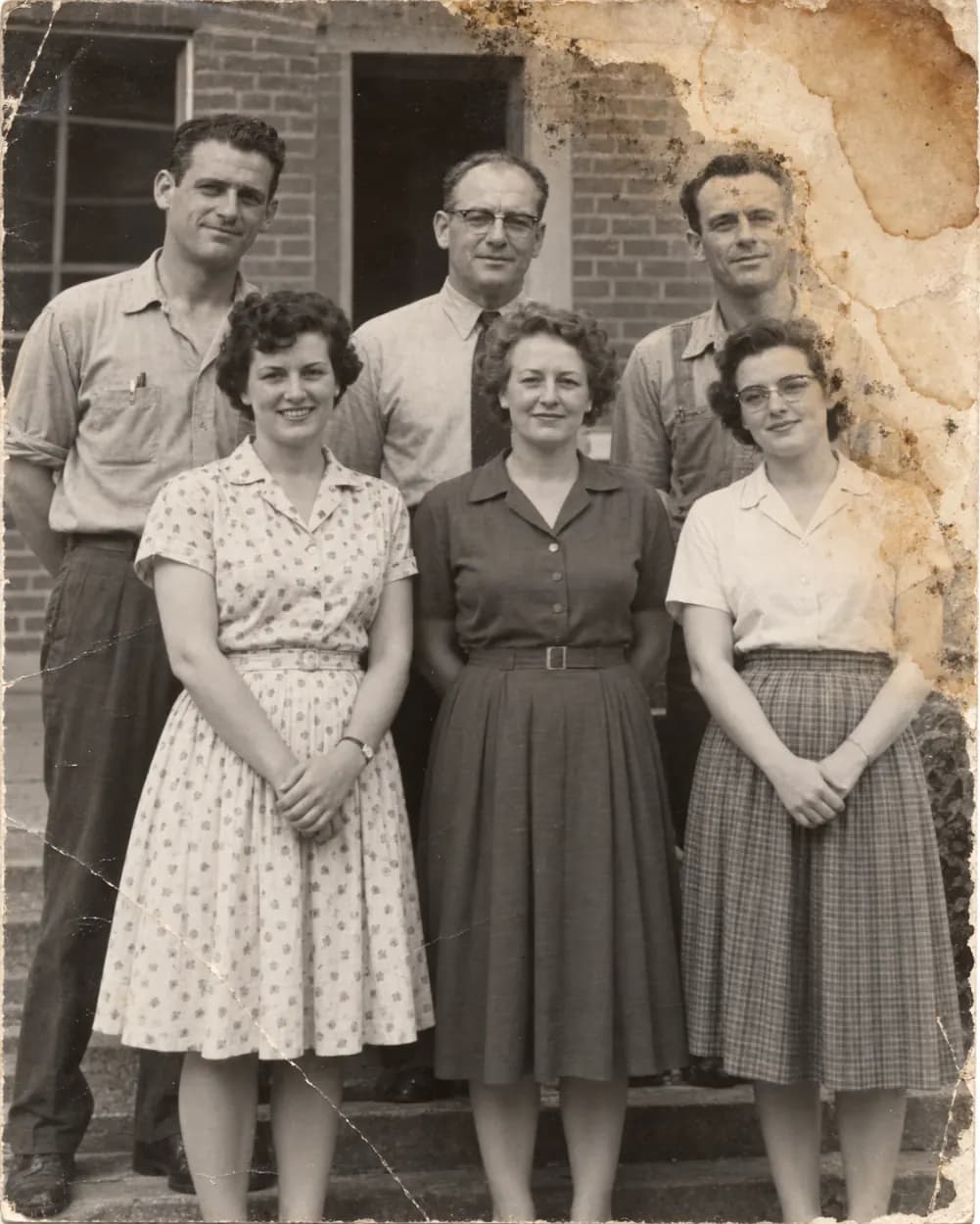 Before: Old school group photo with a water-stained corner cleaned up and colorized